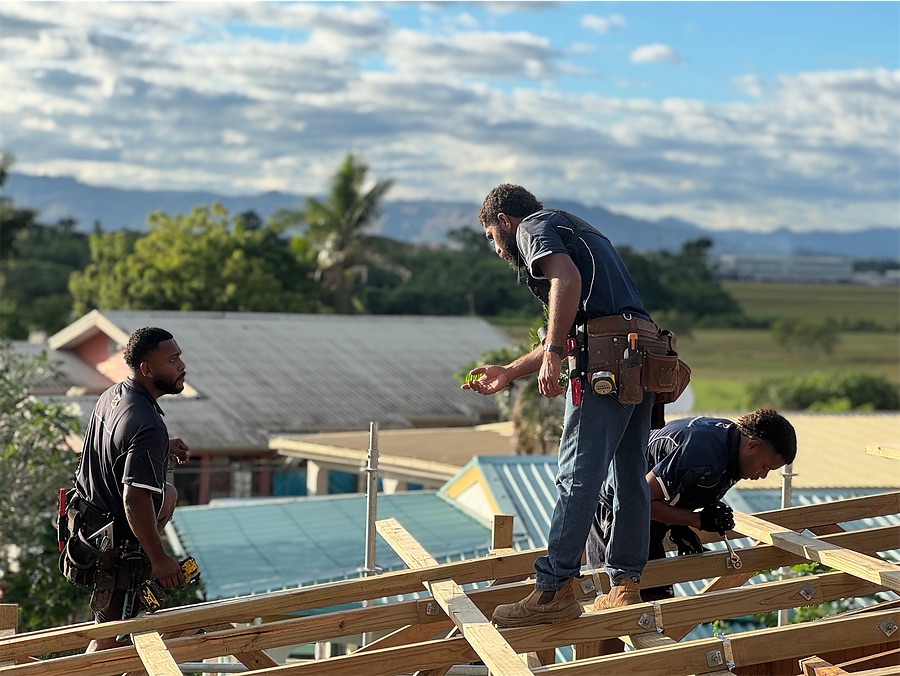 Crew framing a roof