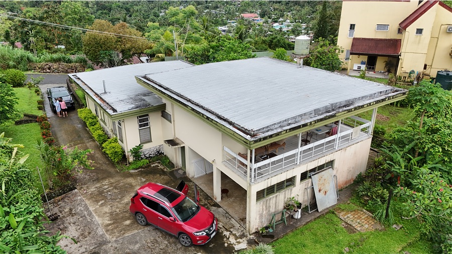 Before: the original house from the air