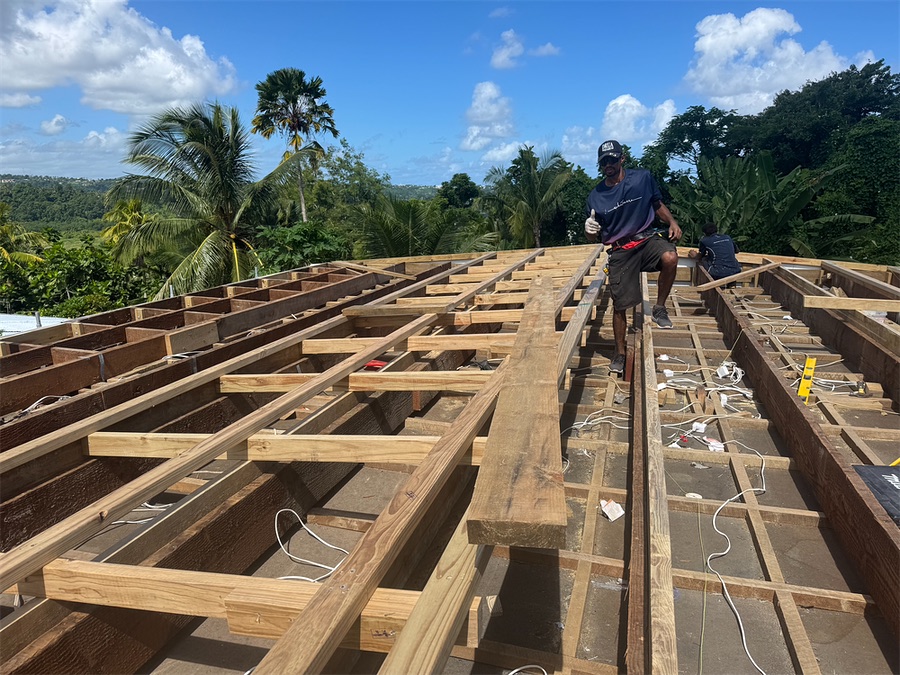 The Eden crew building the new roof structure in Lami