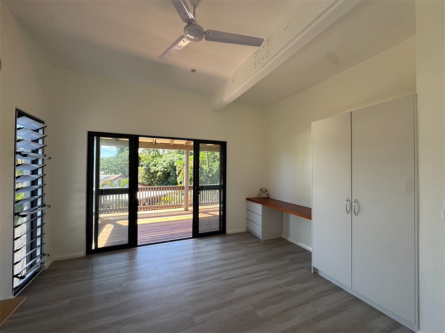 Renovated bedroom with louvre windows