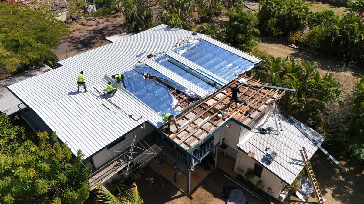 Eden crew replacing a roof, seen from the air