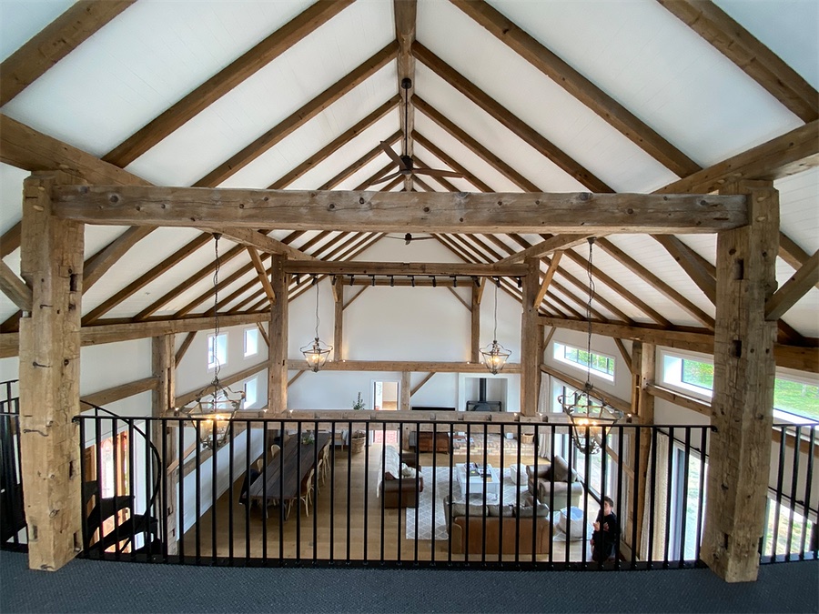 Exposed timber trusses over the gallery
