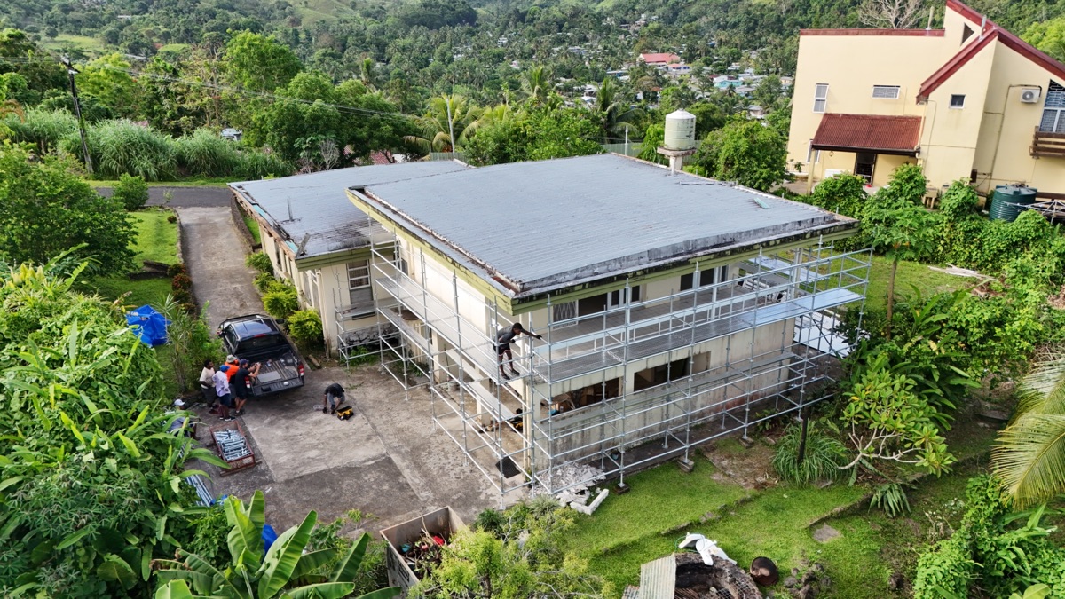 Scaffolding around a two-storey home under construction in Suva