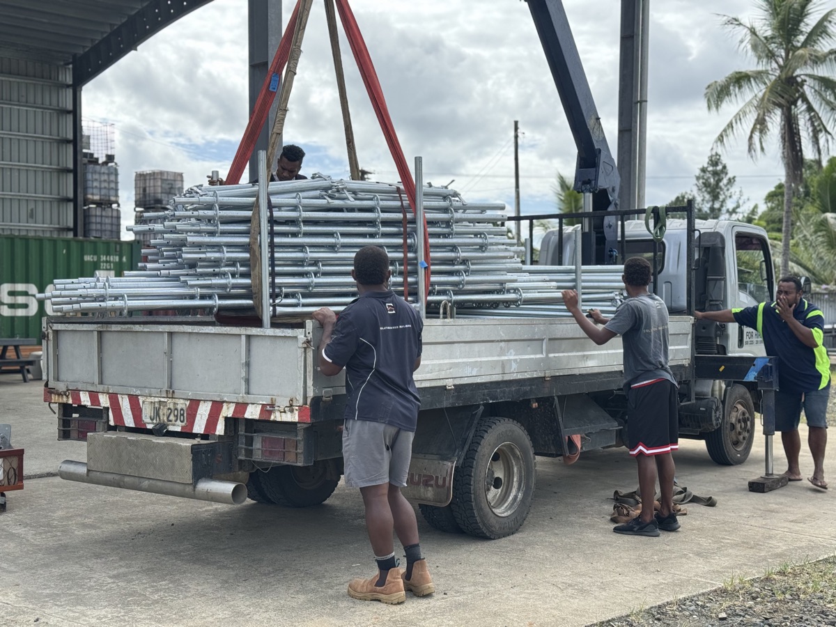 The Eden crew unloading scaffolding at the yard